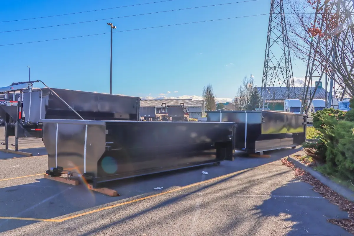 Roll-off dumpster ready for waste disposal at job site for 3 Yard Dumpster Rental in Asbury